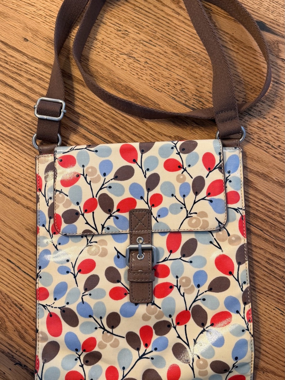 Boden Oilcloth Crossbody Bag with Red, Blue and Brown Leaf Print